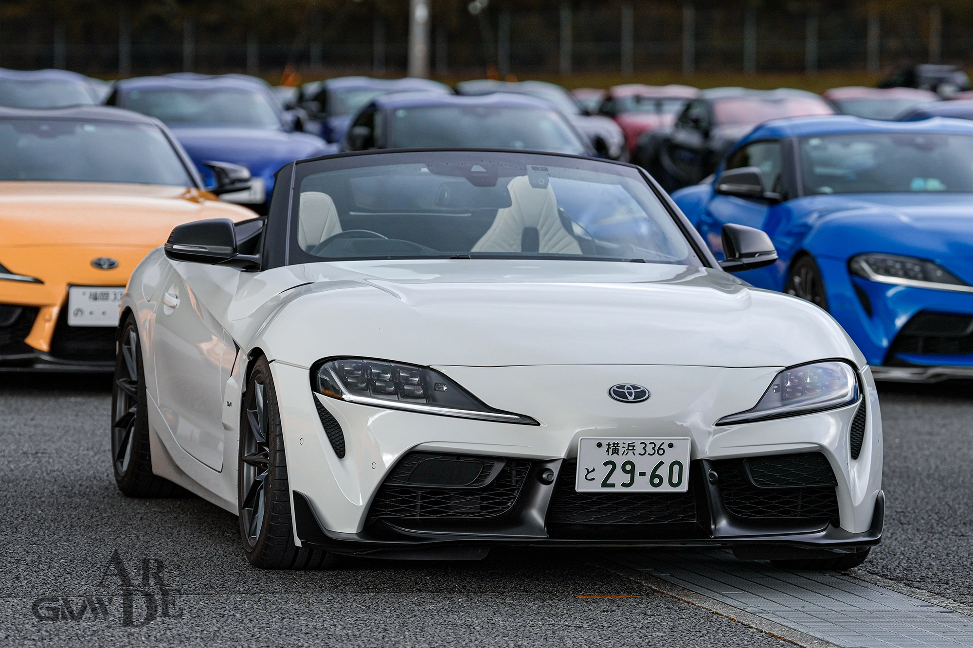 Car with 'arde' art wrapping that gives a wide and low appearance.